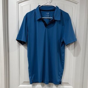 EUC Oakley Men's Blue Polo Shirt